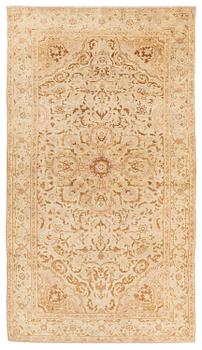 424. An Antique Amritsar rug, northern India, c. 212 x 122 cm.