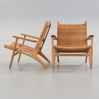 Hans J. Wegner, a pair of 'CH-27' easy chairs, CM Madsen Odense, Denmark, 1950-60's.