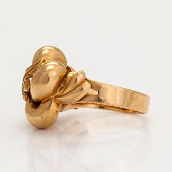 An 18K gold ring. Foreign hallmarks.