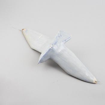 A stoneware sculpture of a sea bird, unsigned.