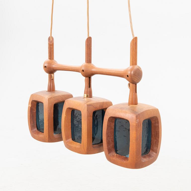A 1960s teak ceiling pendant from Stilarmatur Tranås.