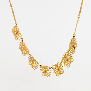 Esko Raitanen, collier, armband och örhängen, 14K guld, Helsingfors 1972.