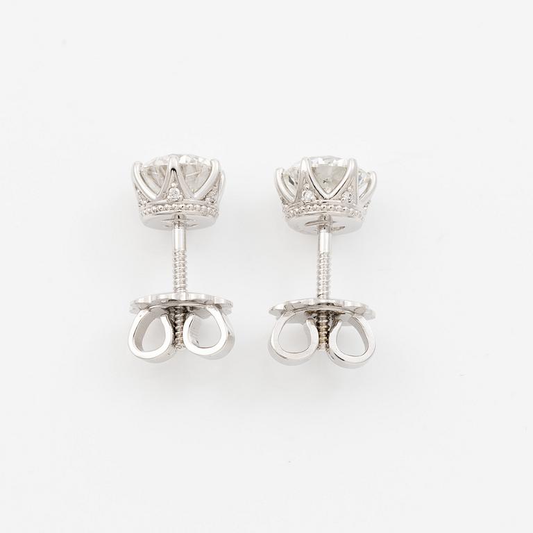 Earrings, single-stone earrings in 18K white gold with brilliant-cut diamonds, accompanied by IGI report.