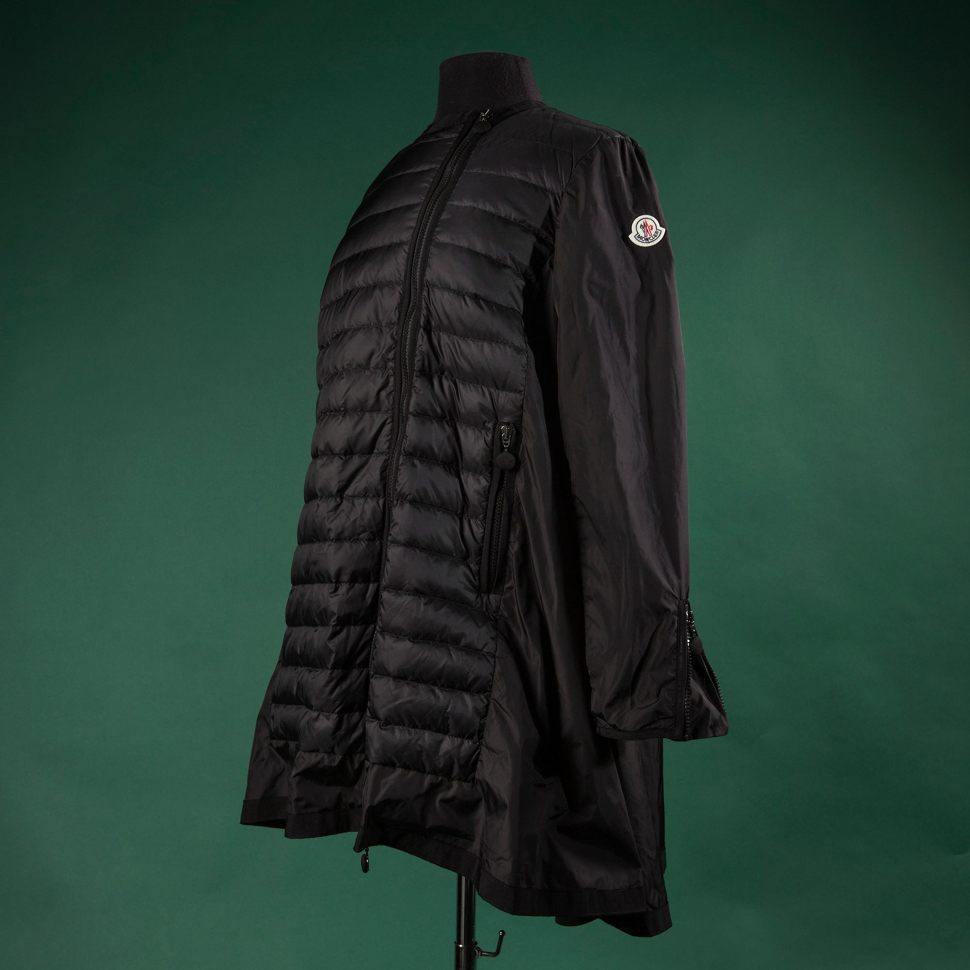 A jacket by MONCLEAR, size 3.