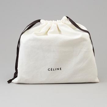 A Cèline Trio bag.