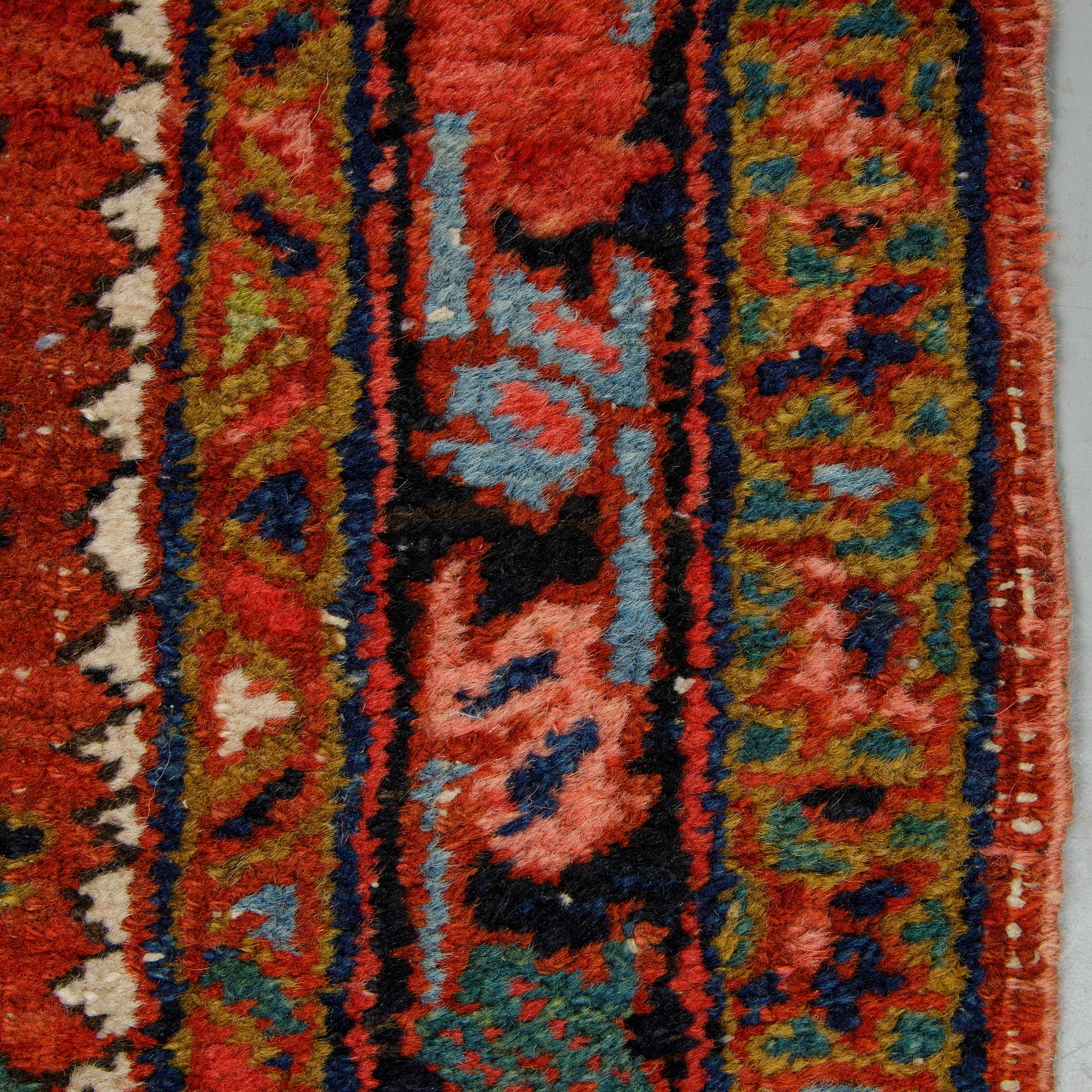 A runner, semi-antique North west persian, ca 362 x 105 cm.