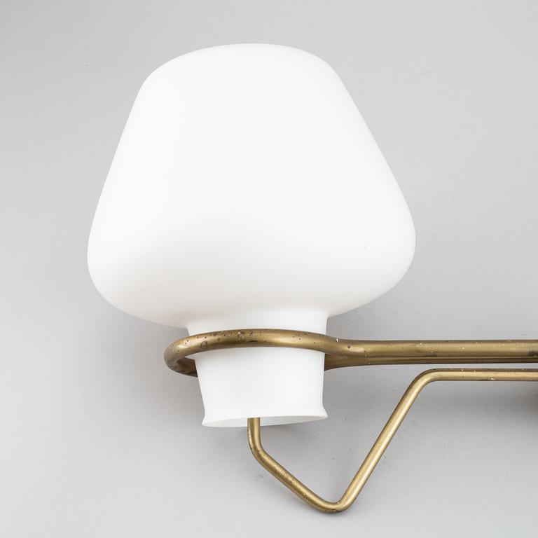 A Elektro skandia wall lamp from the mid 20th century.