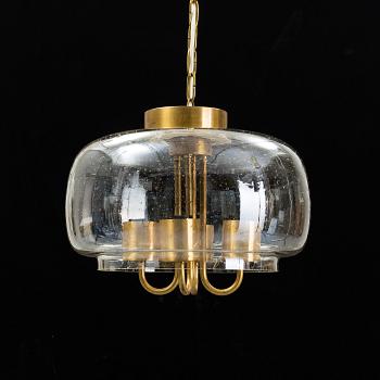 A 1960/70s glass and brass ceiling lamp.