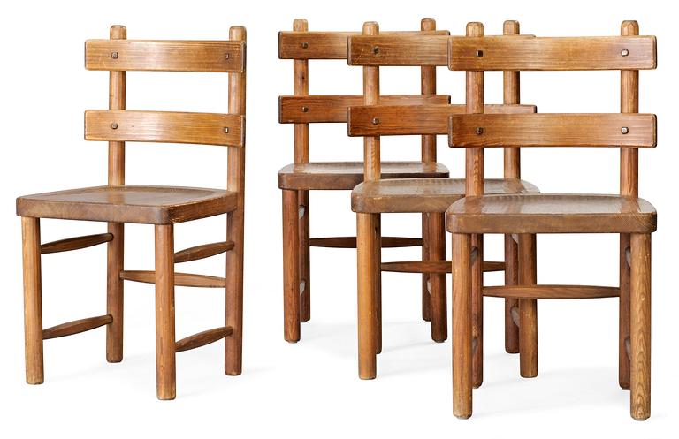An Axel-Einar Hjorth stained pine dinner suite 'Sandhamn', comprising a table with 4 chairs, NK, ca 1929.