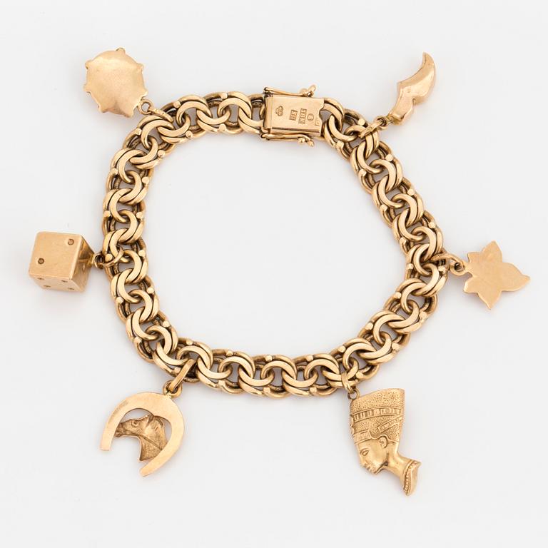 A 18K gold bismark-link, charm-bracelet.