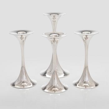 Tapio Wirkkala, A set of four silver candlesticks, "Trumpetti", Kultakeskus, Hämeenlinna 1979 and 1990.