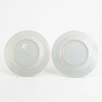 A pair of Chinese famille rose porcelain plates and a vase, Qing dynasty, 18th century.