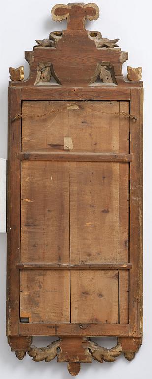 A Gustavian giltwood mirror by C. G. Fyrwald (master in Stockholm 1776-1825).