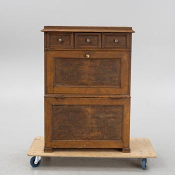 A wooden fire wood box, around 1900.