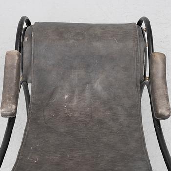 An iron rocking chair, R.W Winfeild & Company, England, late 19th century.
