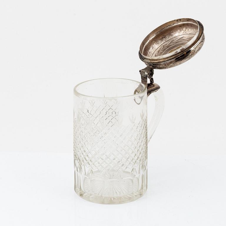 A glass tankard with mount of low fineness silver, 19-20th century.