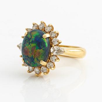 Ring, gold with opal and brilliant and drop-cut diamonds.