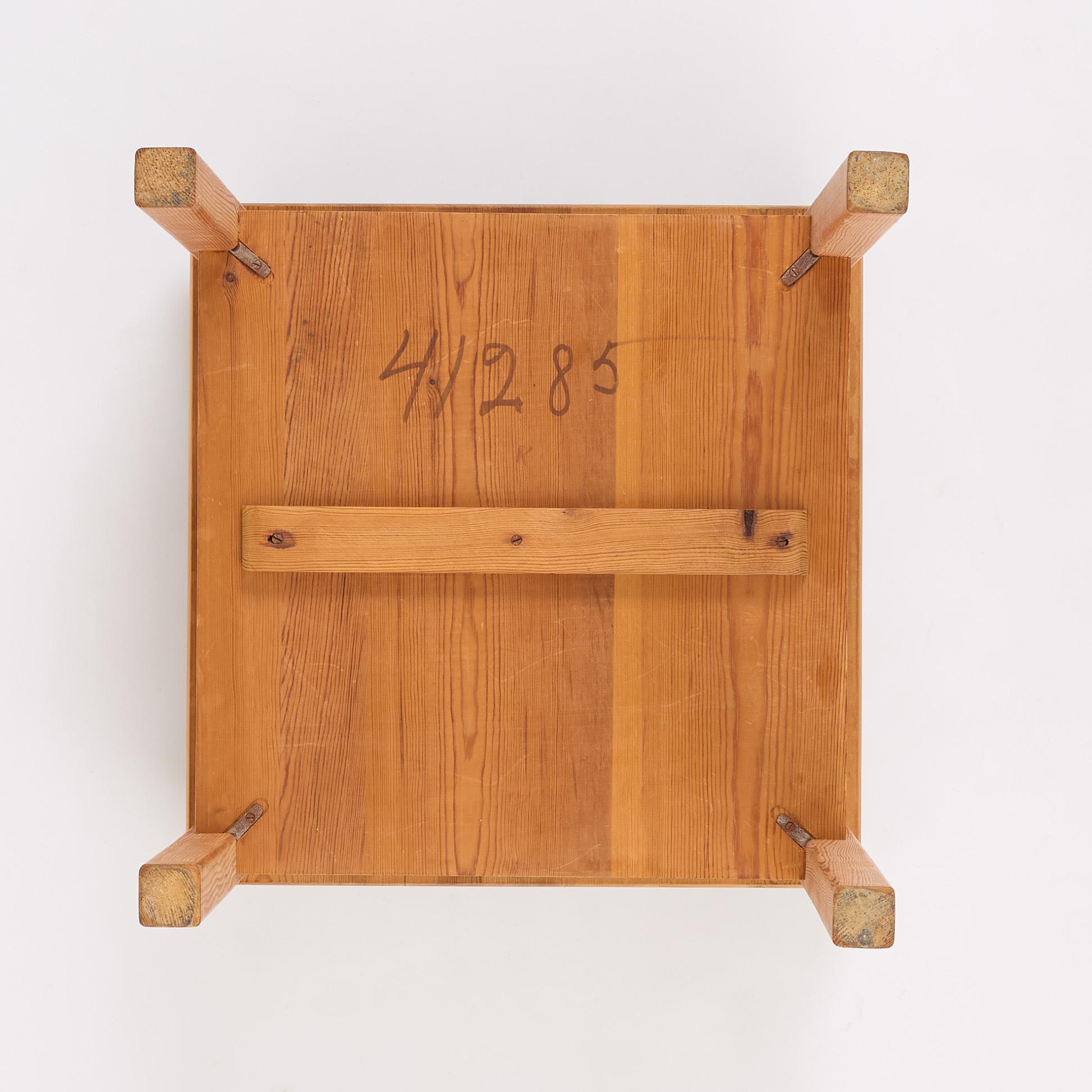 Axel Einar Hjorth, a stained pine "Värmdö" table, Nordiska Kompaniet, Sweden, 1930s.