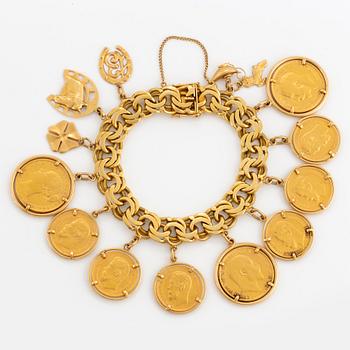 18K gold charm bracelet.