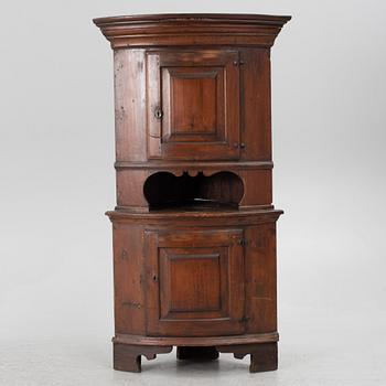 A Swedish corner cabinet, 18th Century.