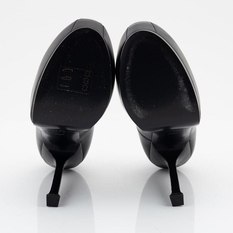 Yves Saint Laurent, a pair of black leather platform pumps, size 36 1/2.