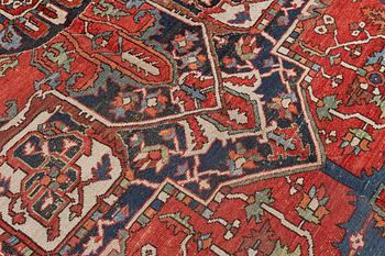 An antique Heris/Karadja carpet, approximately 501 x 339-353 cm.