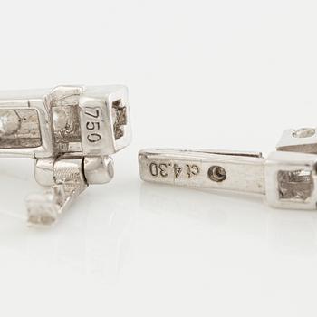 Tennis bracelet in 18K white gold set with brilliant-cut diamonds.