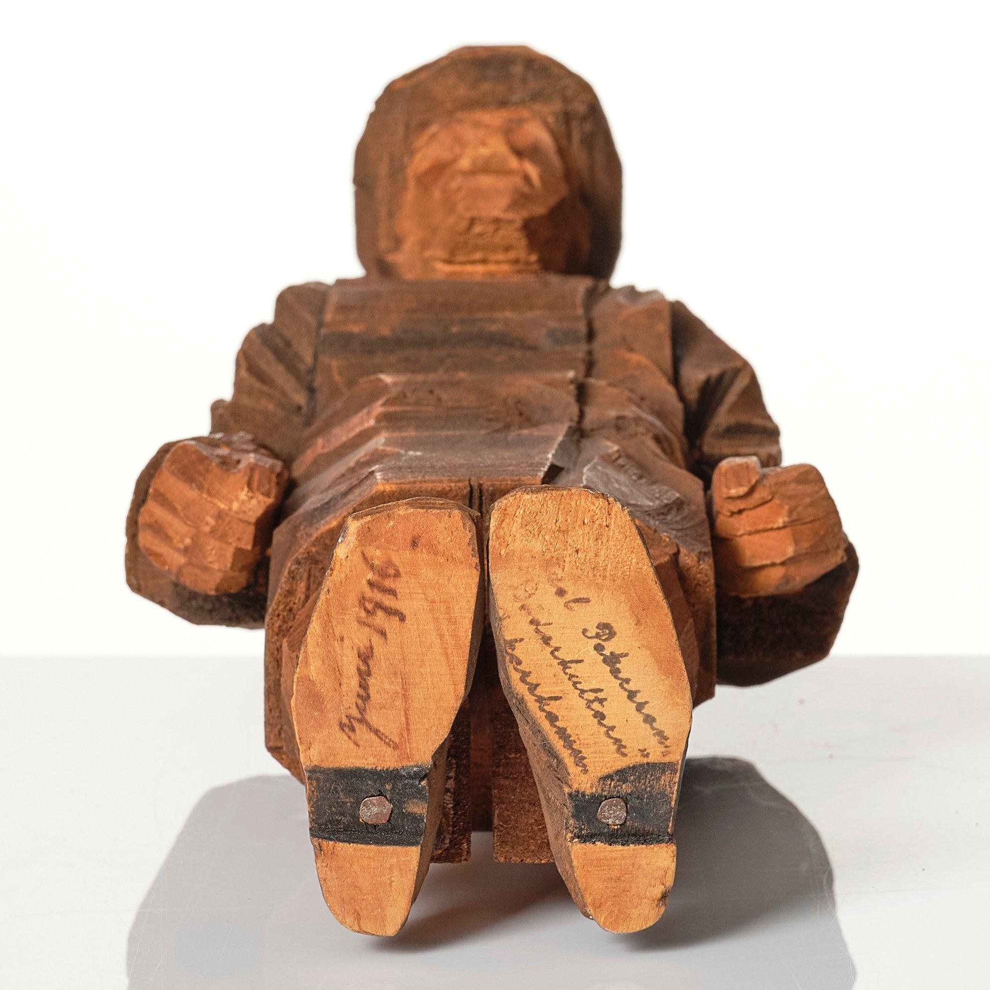 Axel Petersson Döderhultarn, Man with hat.