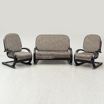 An 'Famulus' sofa and two easy chairs by JP Hully with RD number 809095 for 1936, by Gane Ltd.