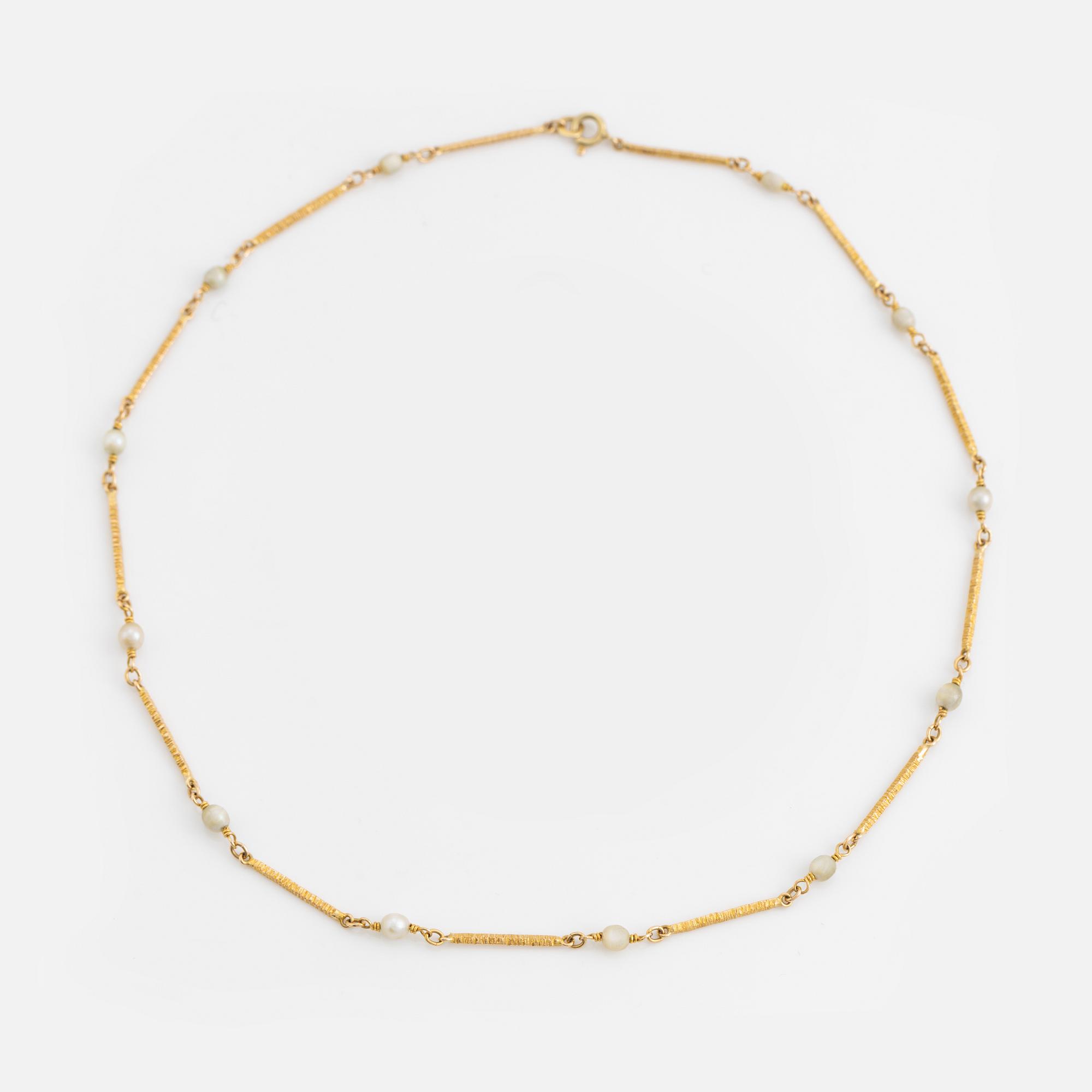 14K gold and pearl bracelet and necklace.