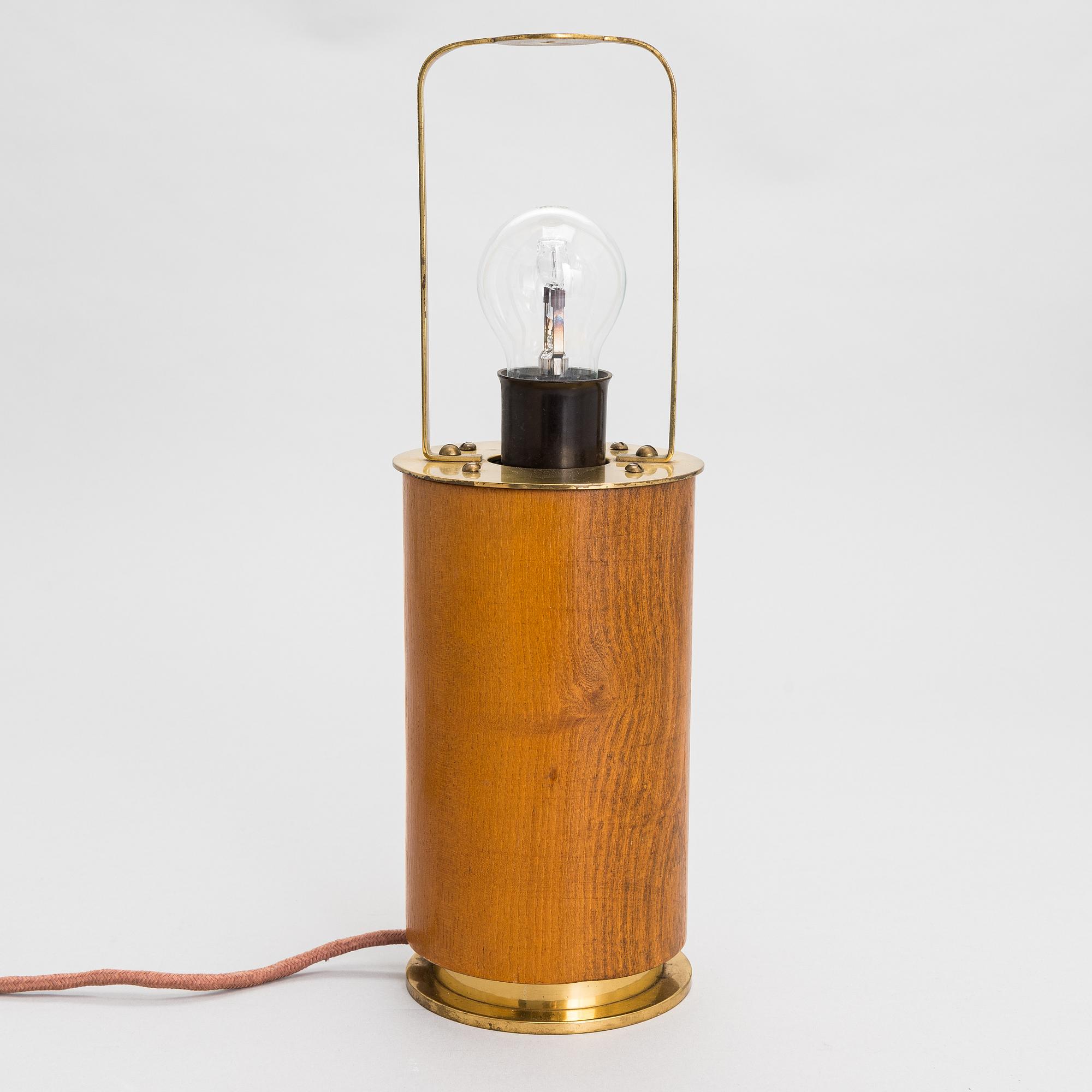 Paavo Tynell, a mid-20th-century table lamp for Taito, Finland.