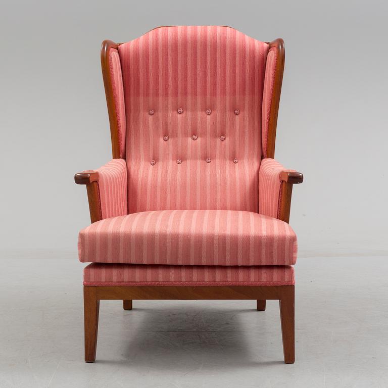 A Carl Malmsten armchair."Husfadern" no 275, 1988.