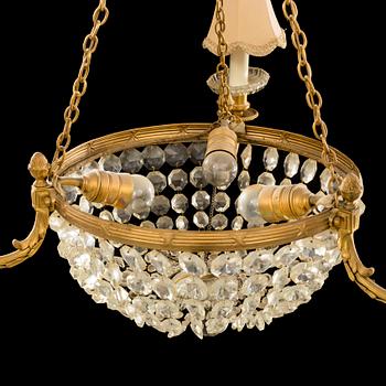 A EMPIRE STYLE CEILING CHANDELIER EARLY 20TH CENTURY.