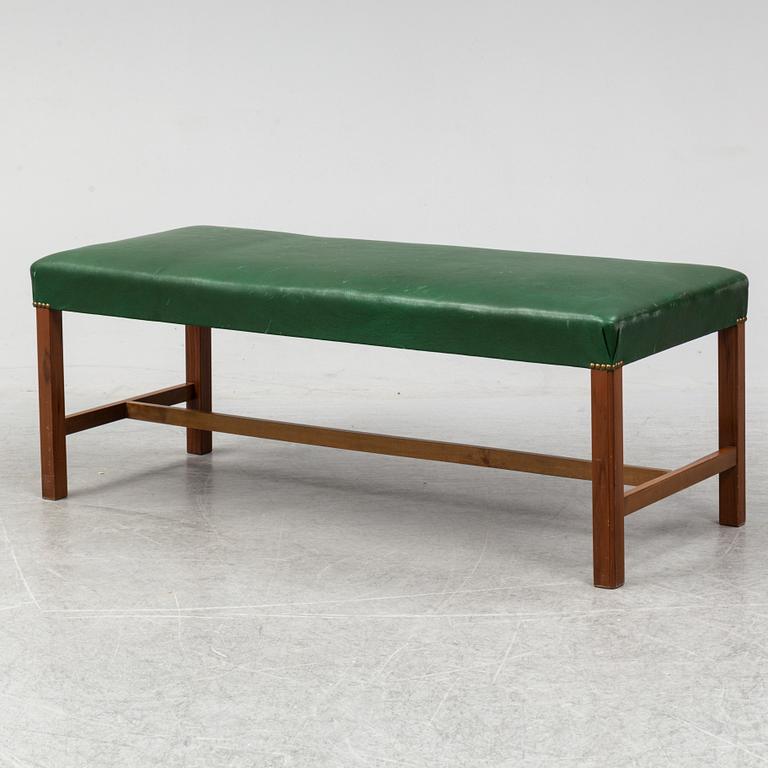 A bench "2082" by Josef Frank for Firma Svenskt Tenn.