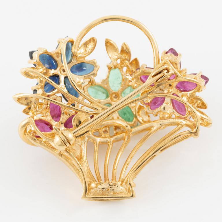 Brooch 18K gold set with round brilliant-cut diamonds as well as emeralds, sapphires, and rubies.