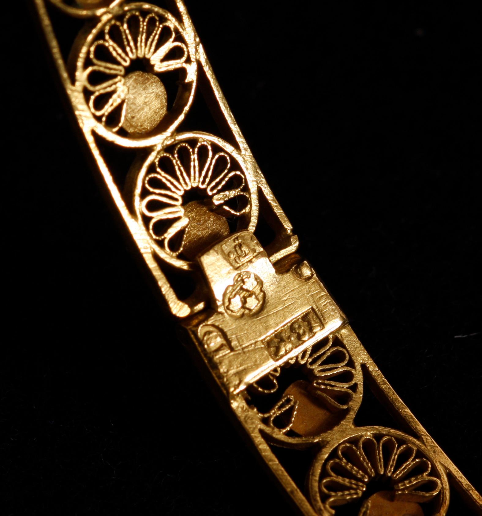 ARMRING, 18 k guld.