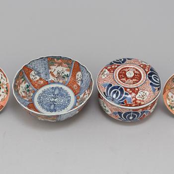An imari bowl with cover, bowl, and a pair of dishes, Japan, Meiji (1868-1912).