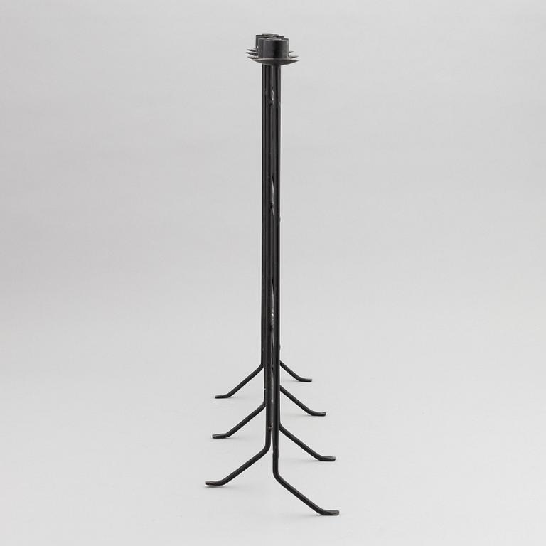 An iron candlestick, second half of the 20th Century.
