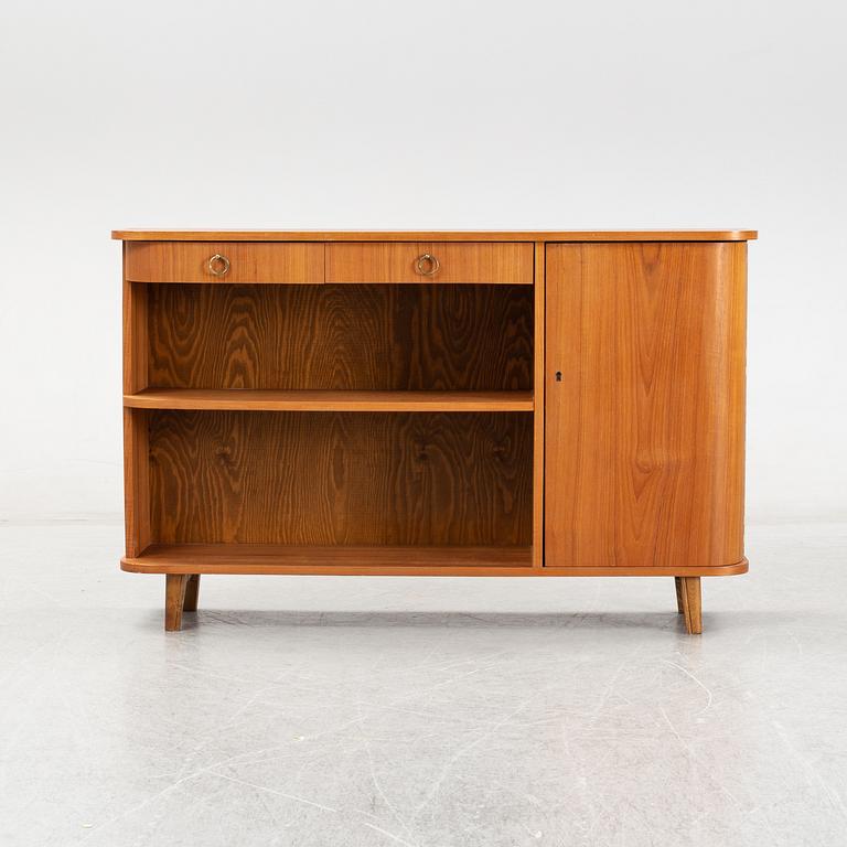 A teak book case. Second half of the 20th Century.