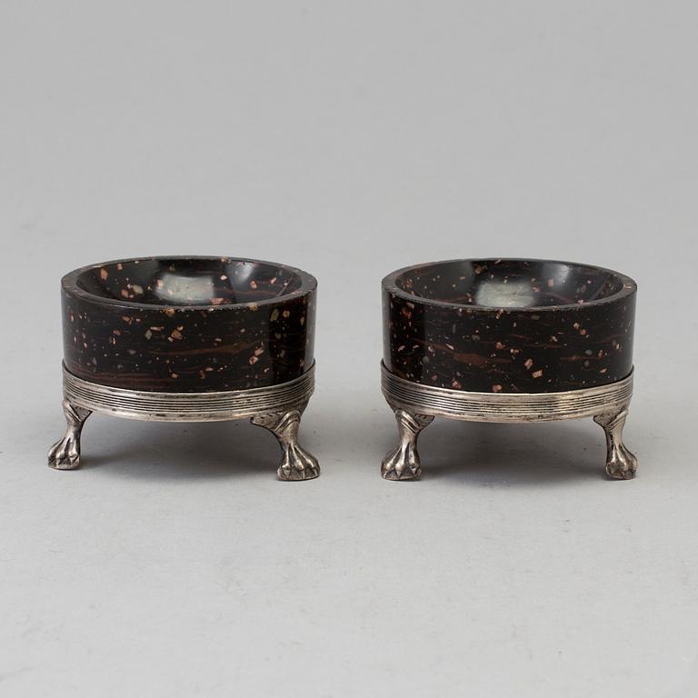 A pair of late Gustavian porphyry and silver salts. Silver maker's mark by Adam Tillström, Växjö 1799.