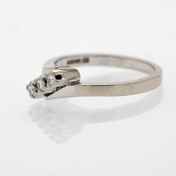 18K white gold ring with diamonds.