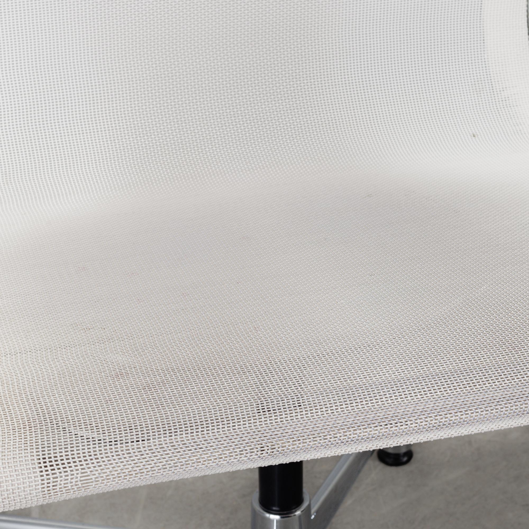 A pair of 'EA 108' desk chairs by Charles & Ray Eames for Vitra.