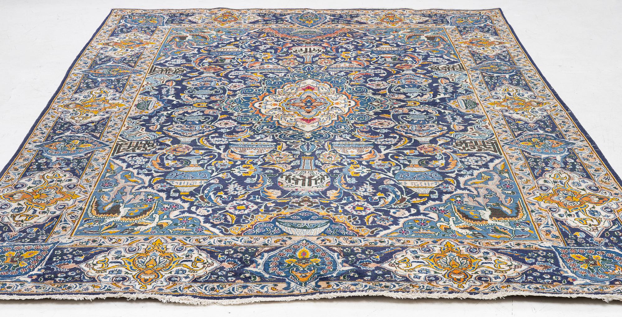 A Kashmar carpet, c. 335 x 242 cm.