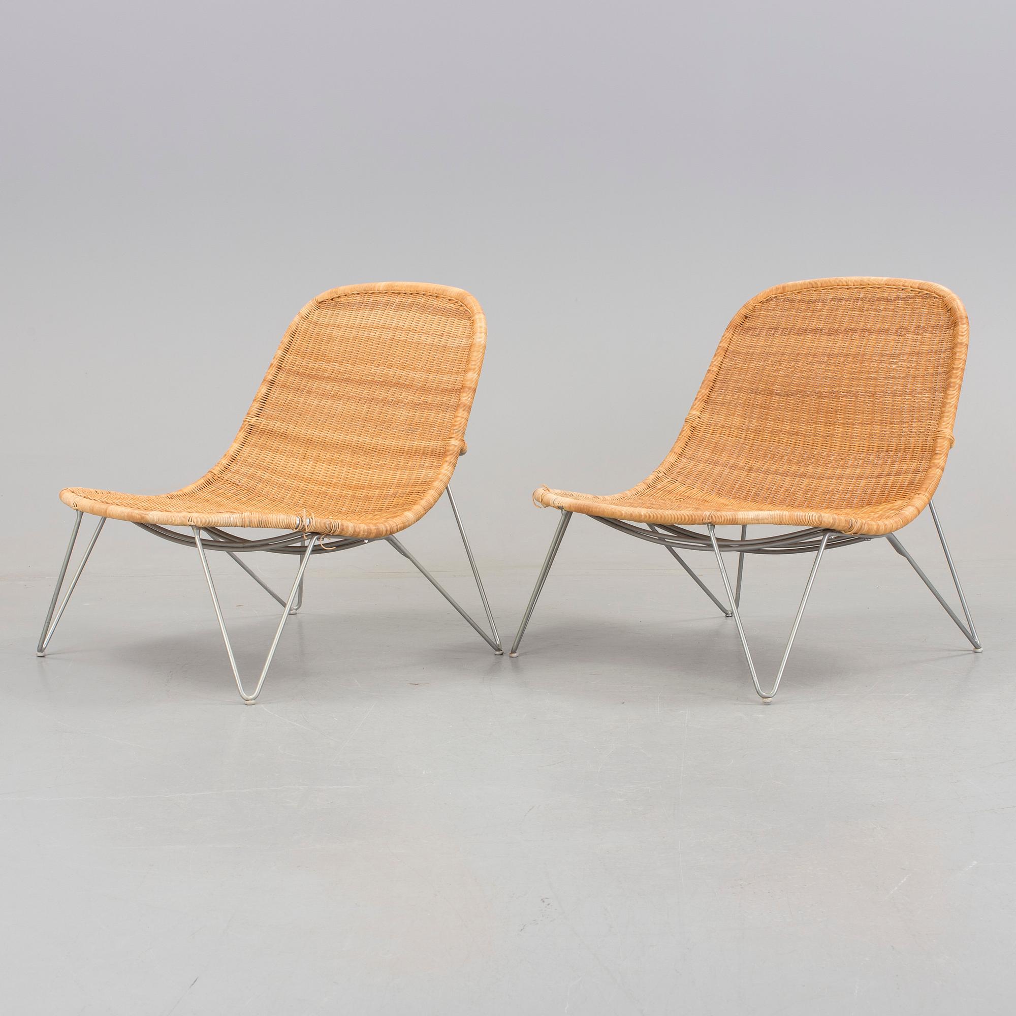 a pair of 21h Century lounge chairs designed by James Irvine, by IKEA.