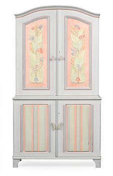 743. A Carl Malmsten cabinet, "Stigberget", with carved and painted decoration of flowers in colours.