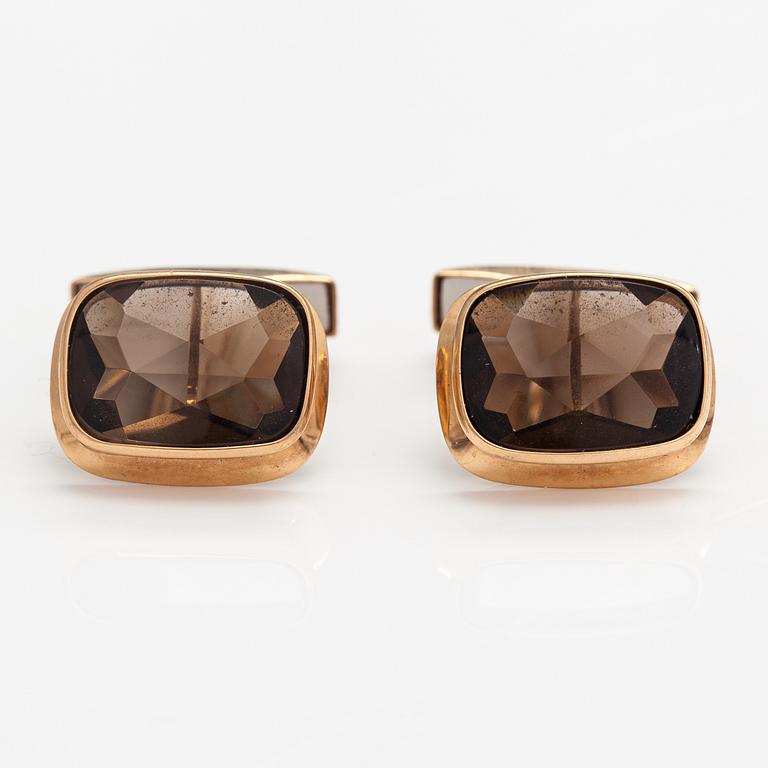 A pair of 14K gold cufflinks with smoaky quartzes. Liitola & Koistinen kultasepät, Turku 1977.