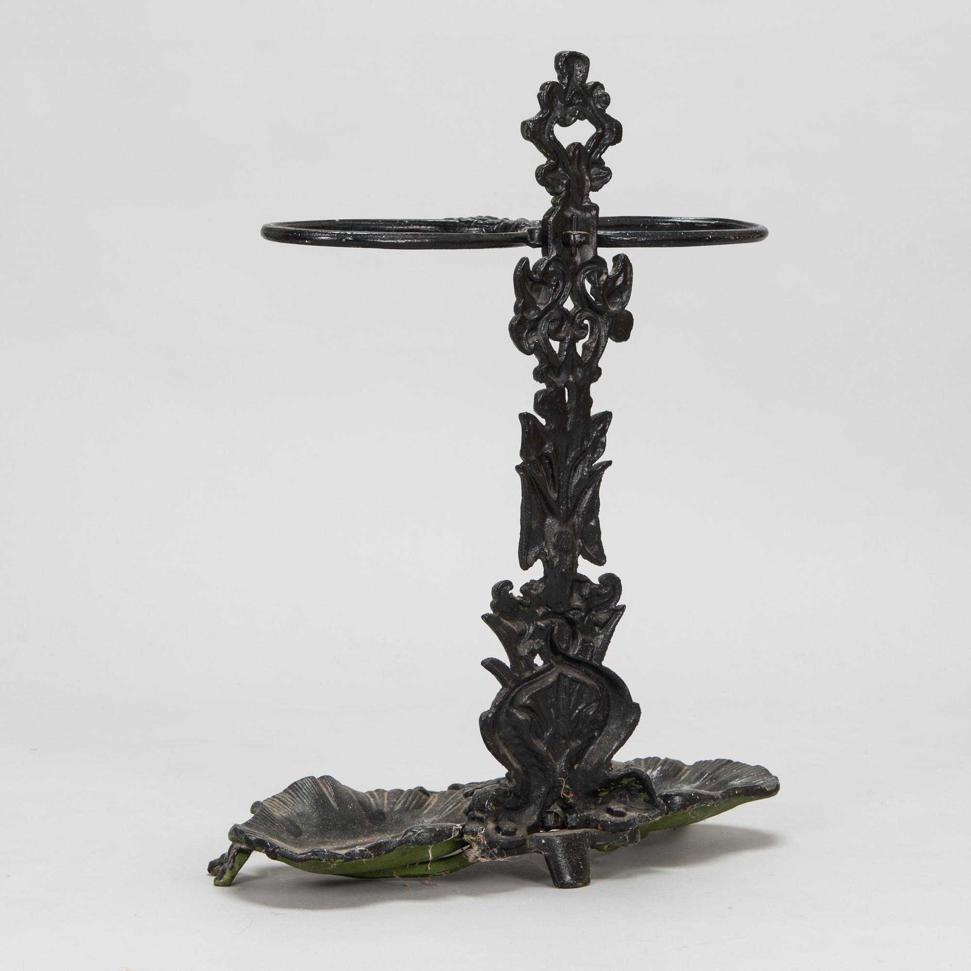 A cast iron umbrella stand, 20th Century.