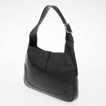 A Black Leather Jackie Bag.