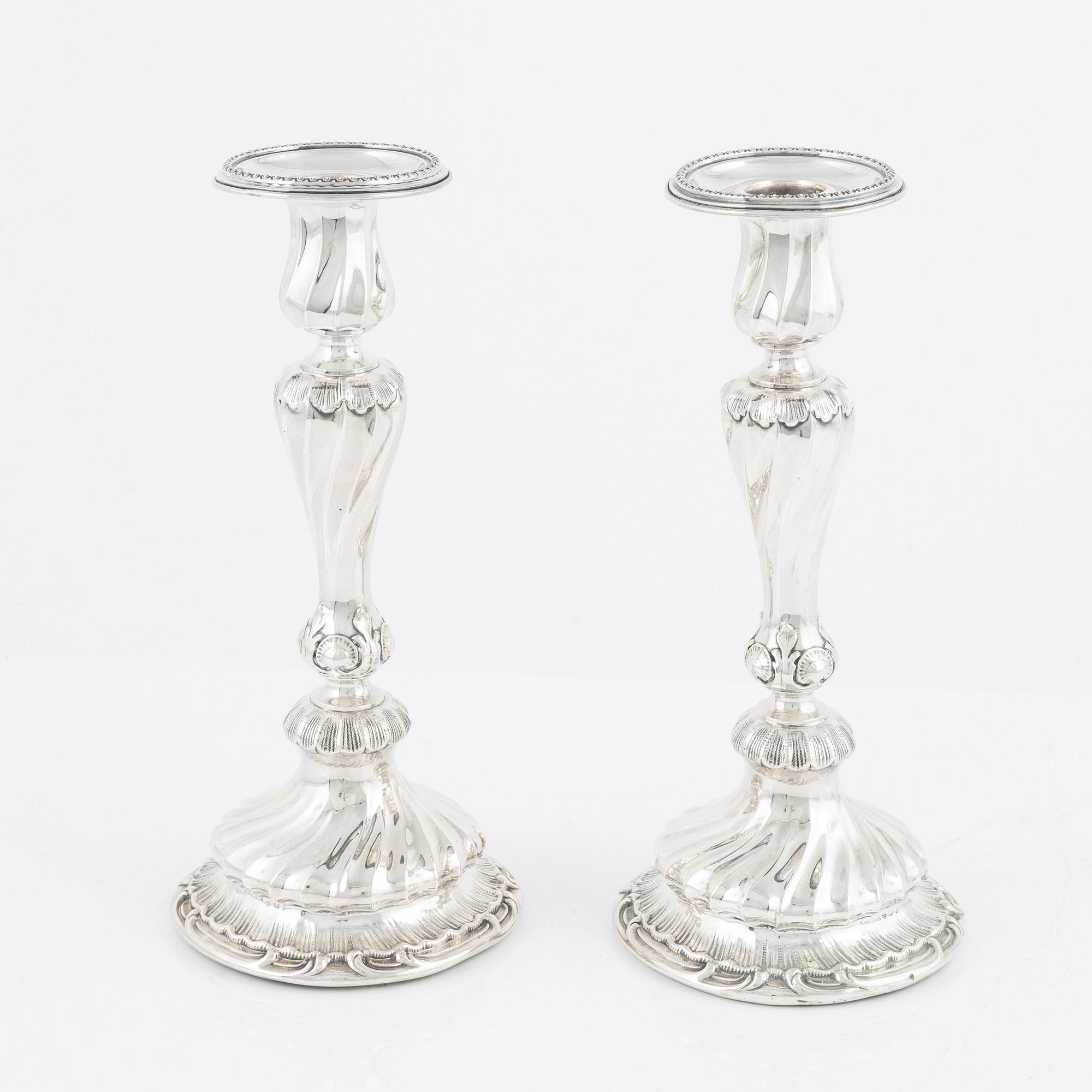 A pair of silver candle sticks by K Anderson Stockholm 1898.
