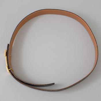 A belt by Hermès.